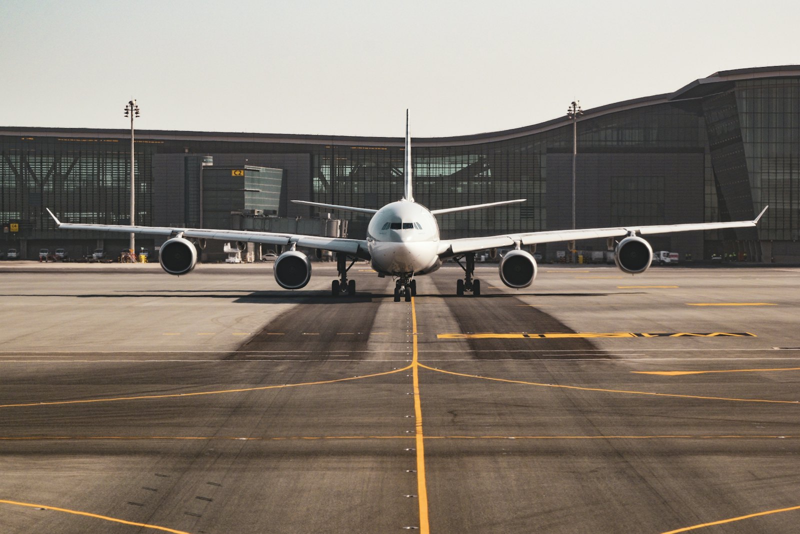 Wide-body freighter aircraft on the apron being prepared for loading