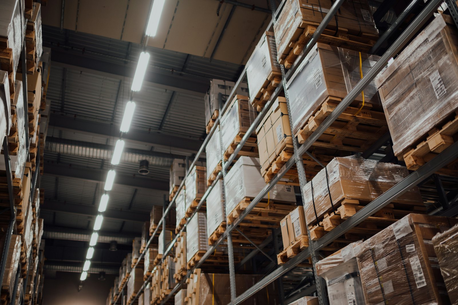 Palletised cargo racked inside a freight consolidation warehouse